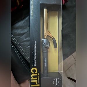 Brand new Paul Mitchell curing iron 1”